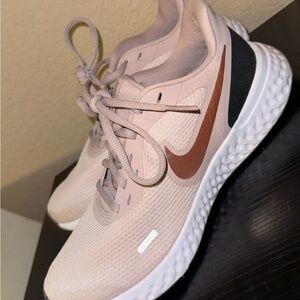 Nike Women's Running Shoes in Light Pink with Brown Swoosh